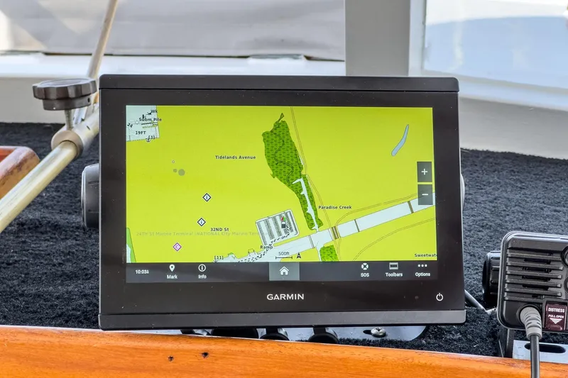 Slide: The Image of Garmin navigation display on 1966 Grand Banks 32 Sedan boat, showing detailed map view. - 73