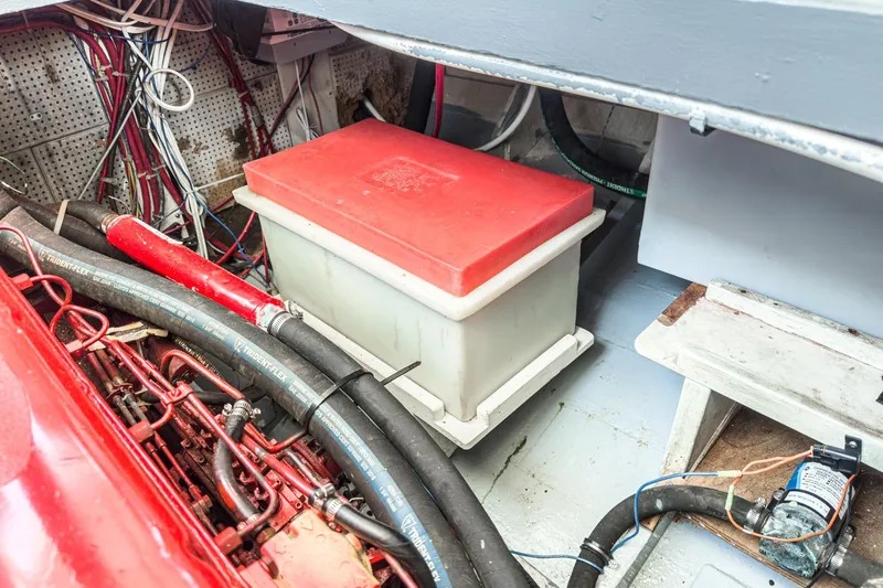 Slide: The Image of Engine room of a 1966 Grand Banks 32 Sedan with wiring and equipment. - 78