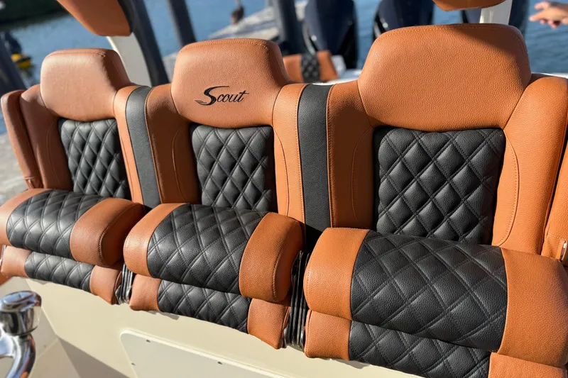 Slide: The Image of Luxurious leather seating on 2019 Scout 355 LXF boat, featuring diamond stitching design. - 23
