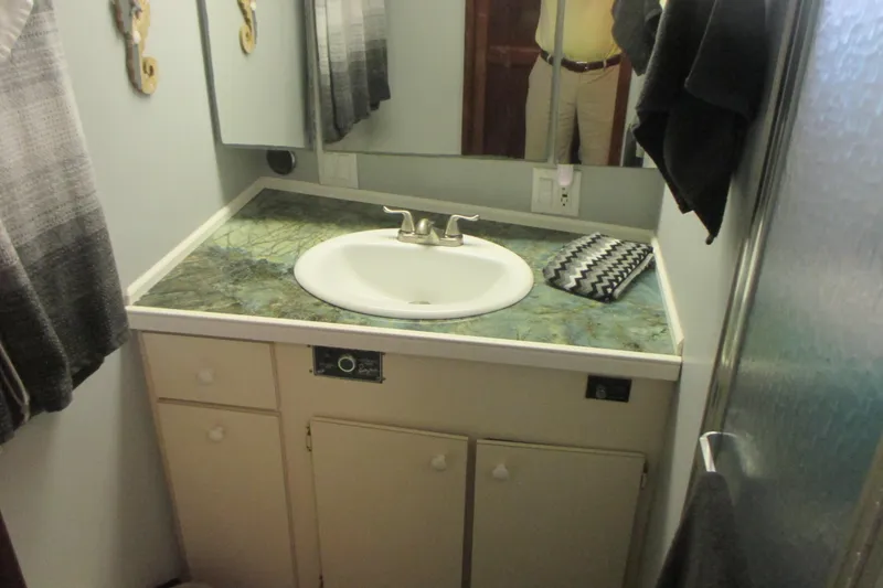 Slide: The Image of Helm of 1981 Hatteras 61 Motor Yacht with Garmin navigation system. - 27