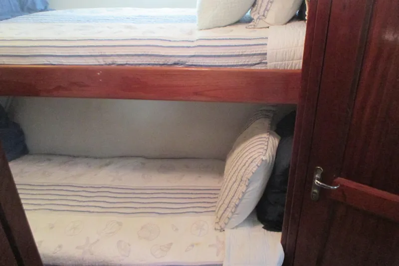 Slide: The Image of Red kayak on deck of 1981 Hatteras 61 Motor Yacht. - 30