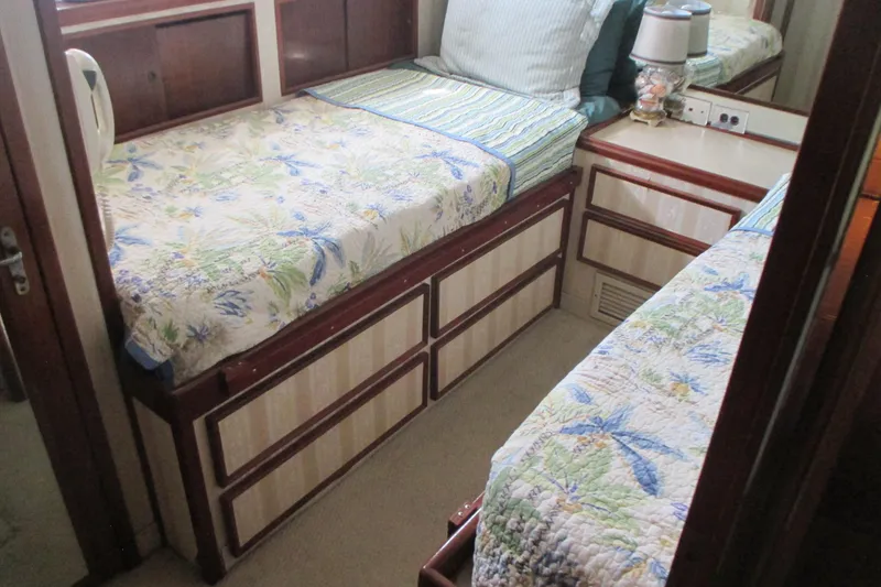 Slide: The Image of Office space inside a 1981 Hatteras 61 Motor Yacht with desk, chair, and lamp. - 34