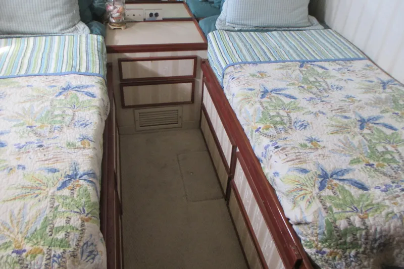 Slide: The Image of Stacked washer and dryer in 1981 Hatteras 61 Motor Yacht laundry area. - 35