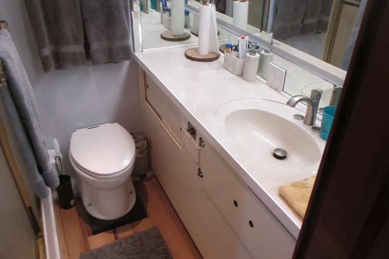 Slide: The Image of Bunk beds in 1981 Hatteras 61 Motor Yacht cabin with striped bedding. - 39