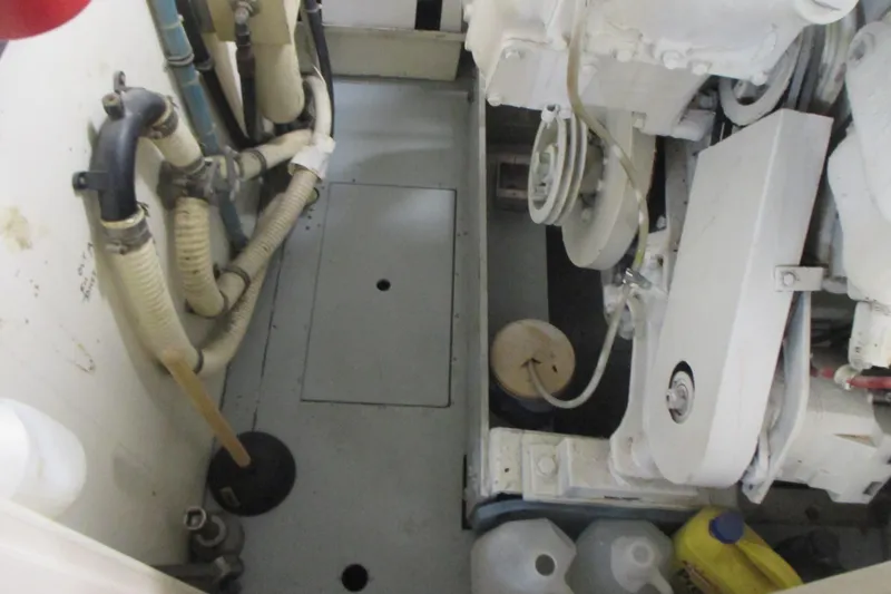 Slide: The Image of Interior of 1981 Hatteras 61 Motor Yacht with twin beds and floral bedding. - 43