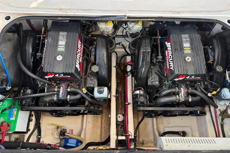 Slide: The Image of Dual engines in a 2000 Regal Commodore 2760 boat. - 17