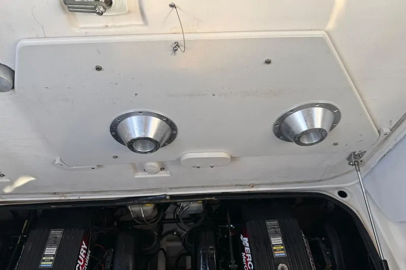 Slide: The Image of 2000 Regal Commodore 2760 engine compartment with dual exhaust vents. - 20