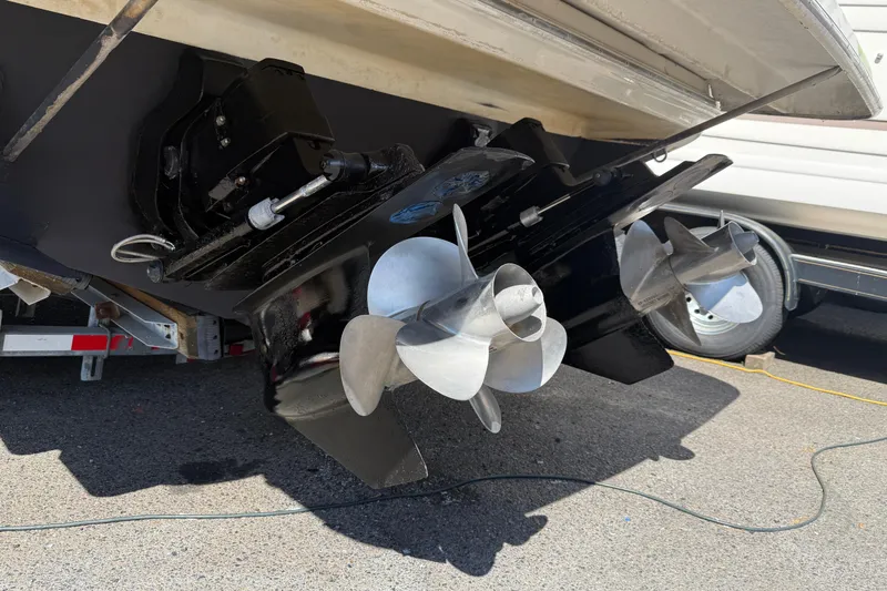 Slide: The Image of Stern view of a 2000 Regal Commodore 2760 boat with dual propellers. - 23