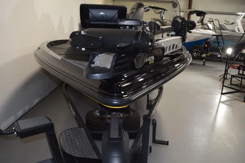 Slide: The Image of 2024 Caymas CX 21 PRO boat with Minn Kota Ultrex motor in showroom. - 13