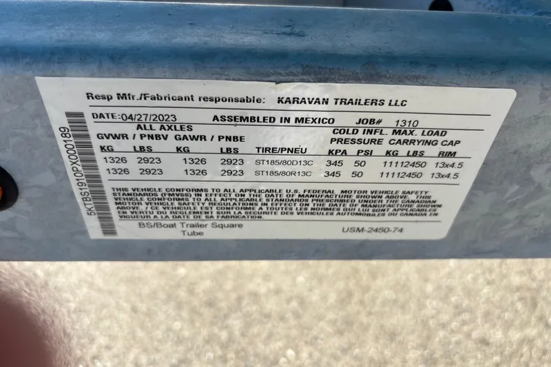 Slide: The Image of Sticker on Karavan trailer, assembled in Mexico, dated 04/27/2023, for Bayliner Element M17. - 16