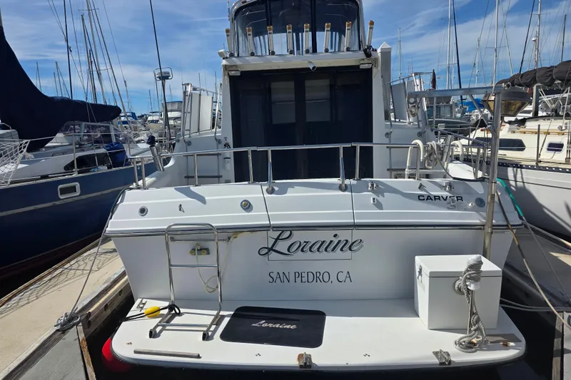 Slide: The Image of 1989 Carver 3297 Mariner boat named "Loraine" docked in San Pedro, CA marina. - 18