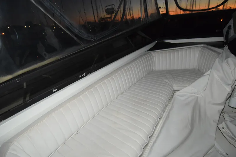 Slide: The Image of Interior seating of 1989 Carver 3297 Mariner boat at sunset. - 7