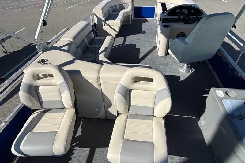 Slide: The Image of 2023 Lexington 321 Fish pontoon boat interior with spacious seating and modern helm. - 11