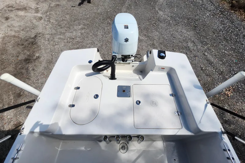 Slide: The Image of 2022 Carolina Skiff 178 JLS boat with outboard motor, viewed from above. - 22