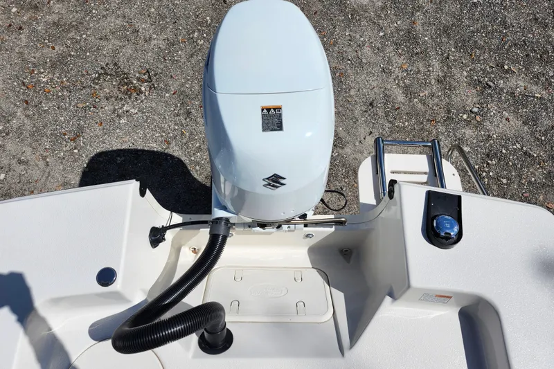 Slide: The Image of 2022 Carolina Skiff 178 JLS boat engine and deck, top view. - 26