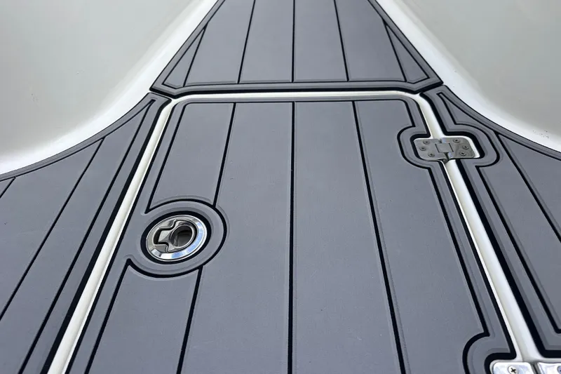Slide: The Image of 2020 NauticStar 25 XS boat deck with sleek, modern design and secure fittings. - 51