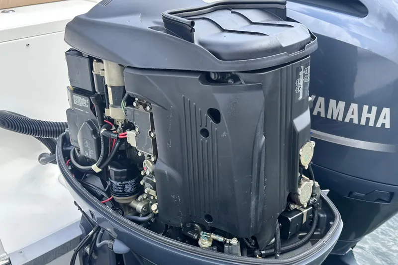 Slide: The Image of 2020 NauticStar 25 XS boat with Yamaha outboard motor, engine detail view. - 66