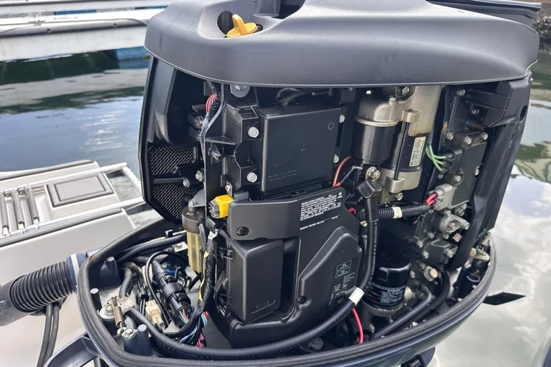 Slide: The Image of 2020 NauticStar 25 XS boat engine, detailed view of internal components. - 67