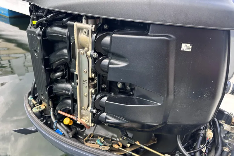 Slide: The Image of 2020 NauticStar 25 XS outboard engine close-up, showcasing internal components and design. - 73