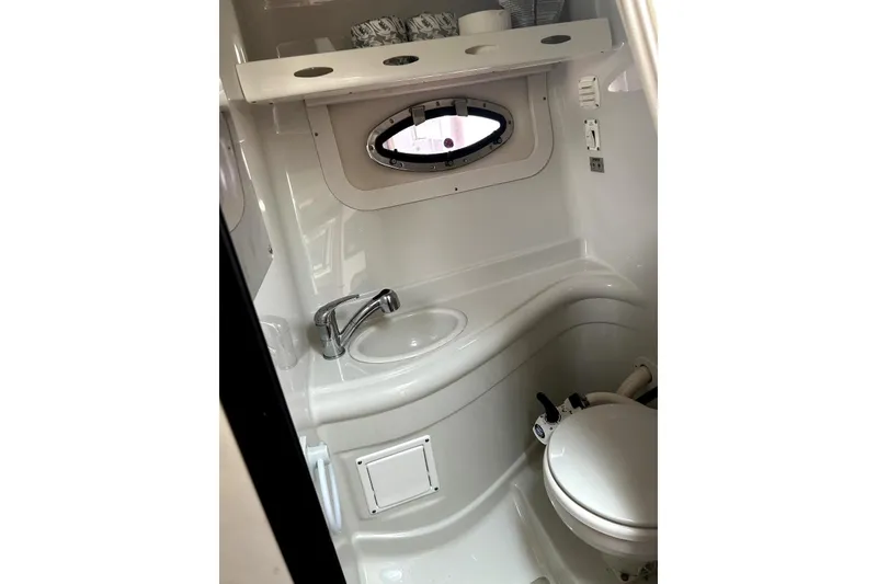 Slide: The Image of Fusion MS-RA70 Bluetooth stereo system on 2012 Crownline 260 CR boat dashboard. - 19