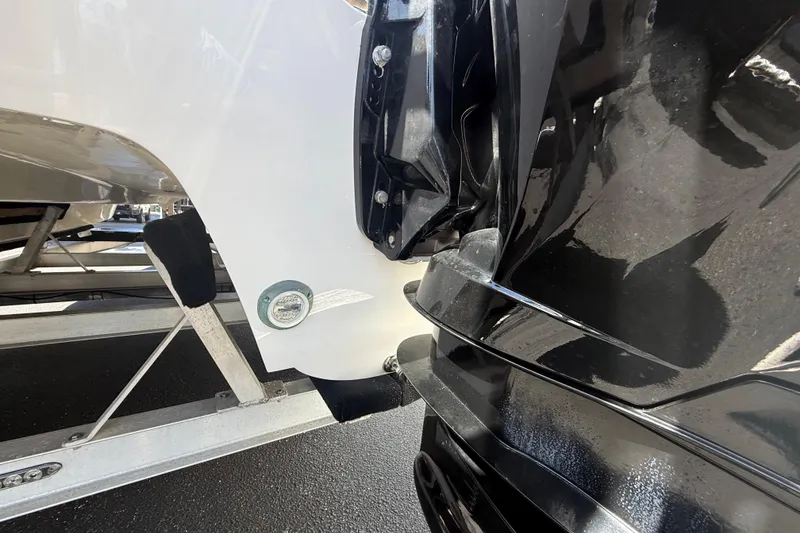 Slide: The Image of Close-up of a 2019 Calcutta 263 boat's engine and hull on a trailer. - 11