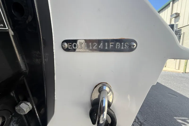 Slide: The Image of Calcutta 263 boat, 2019 model, with visible serial number plate and key lock. - 15