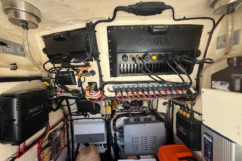 Slide: The Image of Electrical system setup in a 2019 Calcutta 263 boat, featuring Simrad and NAC-3 components. - 42