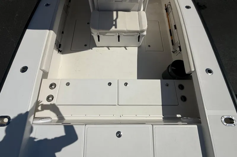 Slide: The Image of 2019 Calcutta 263 boat interior with seating and storage compartments. - 50