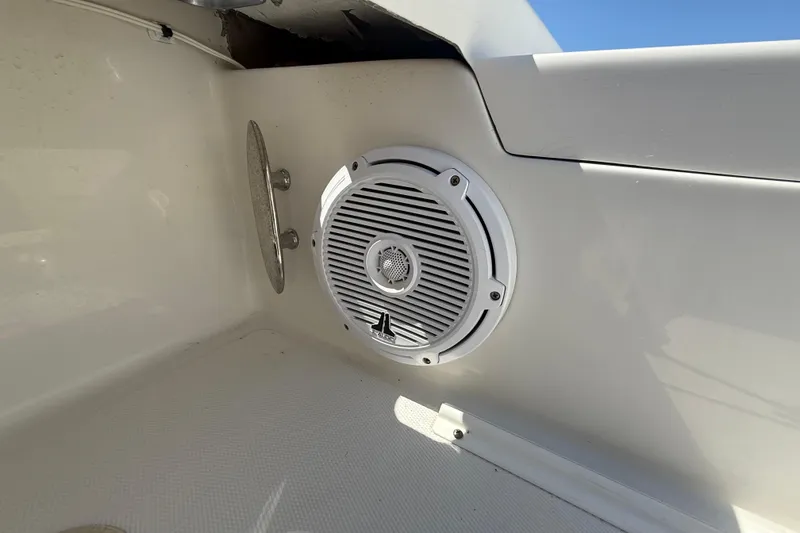 Slide: The Image of Boat speaker and vent on 2019 Calcutta 263 model, white interior. - 54