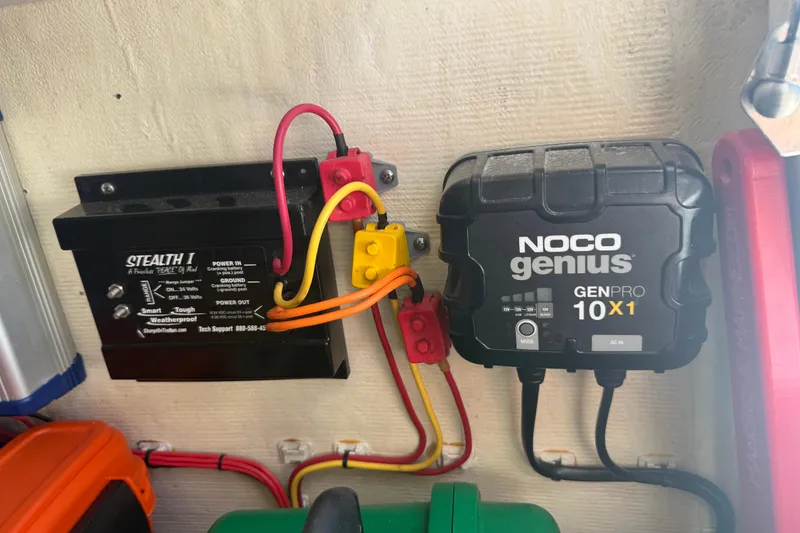 Slide: The Image of NOCO Genius GENPRO 10X1 charger and Stealth I system in Calcutta 263, 2019 model. - 61