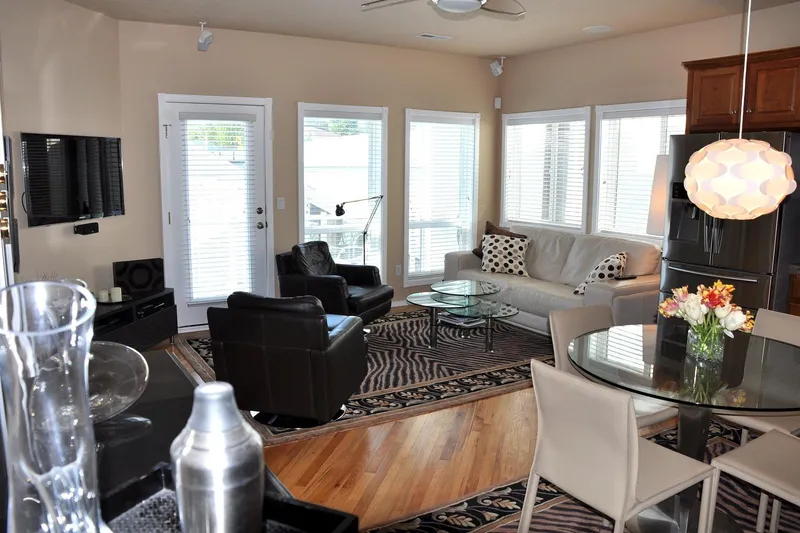 Slide: The Image of Modern living area in Steelhead Marine Boat House, featuring stylish furniture and decor. - 19