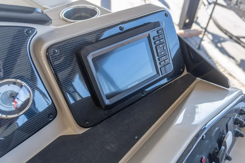 Slide: The Image of Dashboard of 2026 SunCatcher Select 322RC with Garmin navigation system. - 18