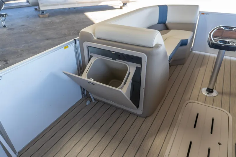 Slide: The Image of 2026 SunCatcher Select 322RC boat interior with seating and storage compartment. - 19