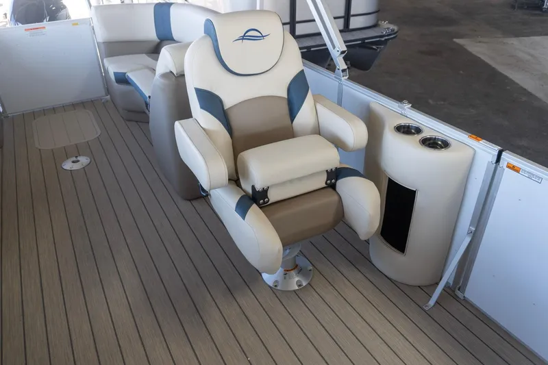 Slide: The Image of Luxurious seating on 2026 SunCatcher Select 322RC pontoon boat with cup holders. - 6