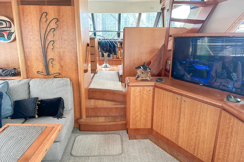 Slide: The Image of Luxurious 2004 West Bay Sonship yacht interior with elegant wood finishes and modern amenities. - 12