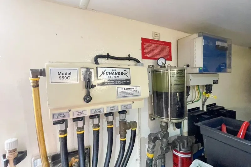 Slide: The Image of Engine room of 2004 West Bay Sonship with oil exchange system and Model 950G. - 28