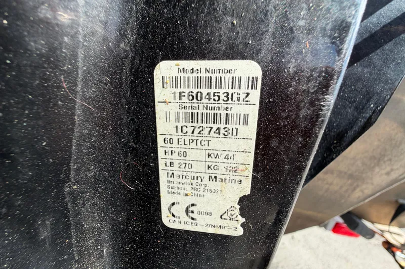 Slide: The Image of Label on a 2023 Lowe SS 210 boat, displaying model and serial numbers. - 48