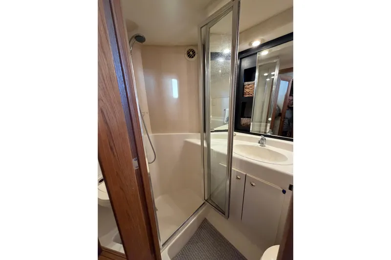 Slide: The Image of Bathroom interior of 1999 Bayliner 4788 Pilot House Motoryacht with shower and sink. - 29