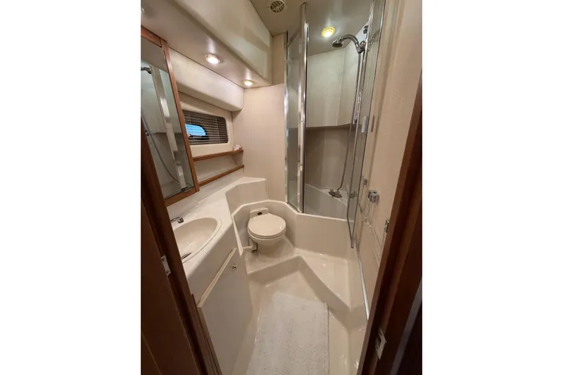Slide: The Image of Bathroom interior of 1999 Bayliner 4788 Pilot House Motoryacht with shower and sink. - 34