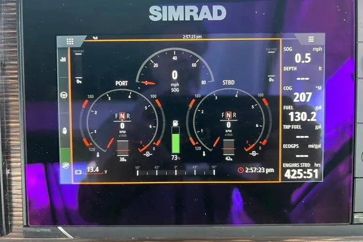 Slide: The Image of Simrad display on 2023 Four Winns H350 OB showing engine and fuel metrics. - 30