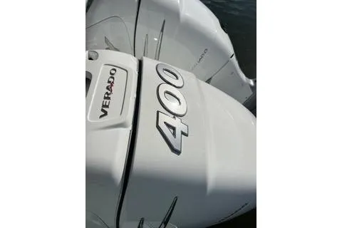 Slide: The Image of 2023 Four Winns H350 OB boat with powerful Verado 400 engine. - 34