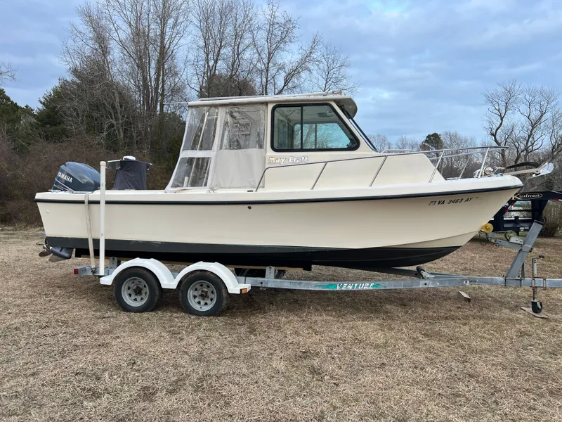 Slide: The Image of 1997 May-Craft 2300 Pilot boat on trailer, sunny day. - 6
