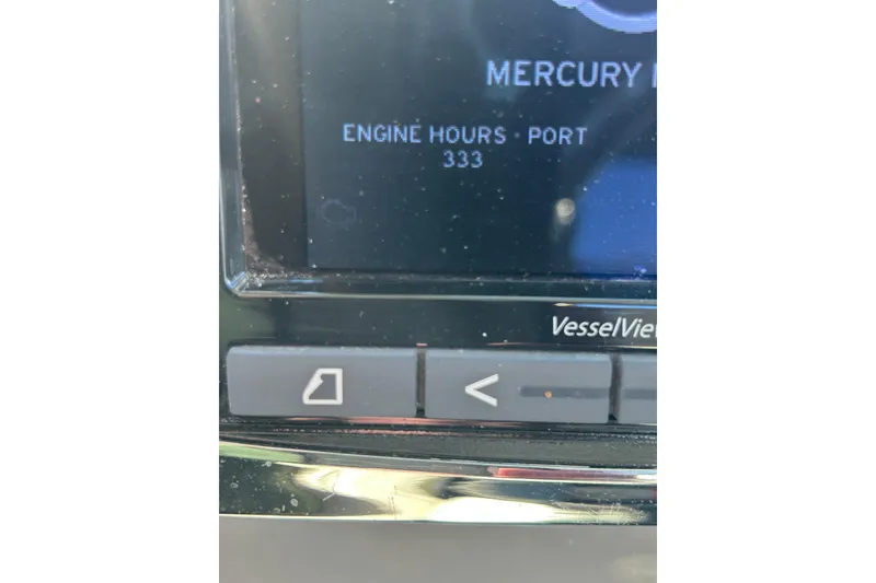 Slide: The Image of Display screen showing engine hours on 2016 Boston Whaler 285 Conquest, reading 333 hours. - 7