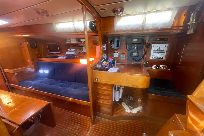 Slide: The Image of Interior of 1981 Nautor Swan cutter with wooden finish and navigation equipment. - 12