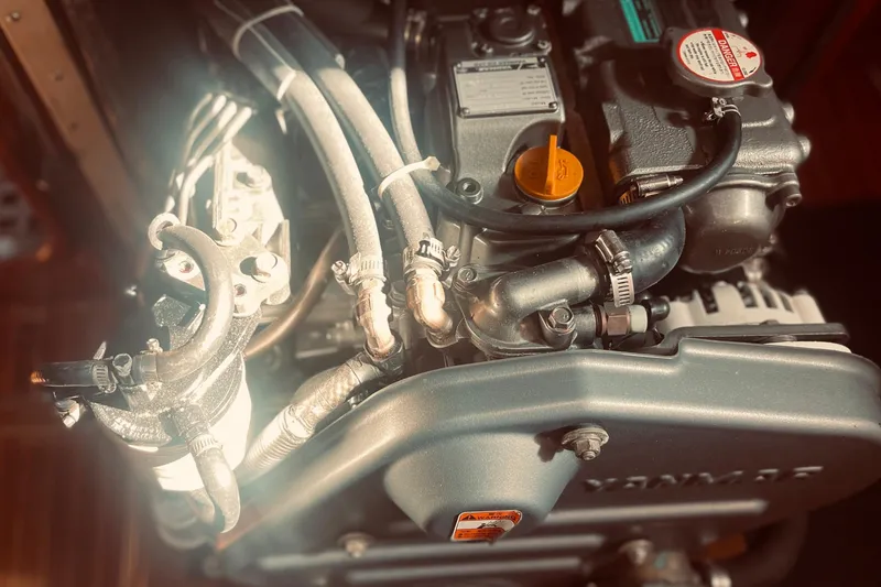 Slide: The Image of Engine of a 1981 Nautor Swan cutter sailboat, showcasing intricate mechanical details. - 26