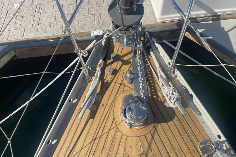 Slide: The Image of Bow of 1981 Nautor Swan cutter with teak deck and anchor chain. - 4