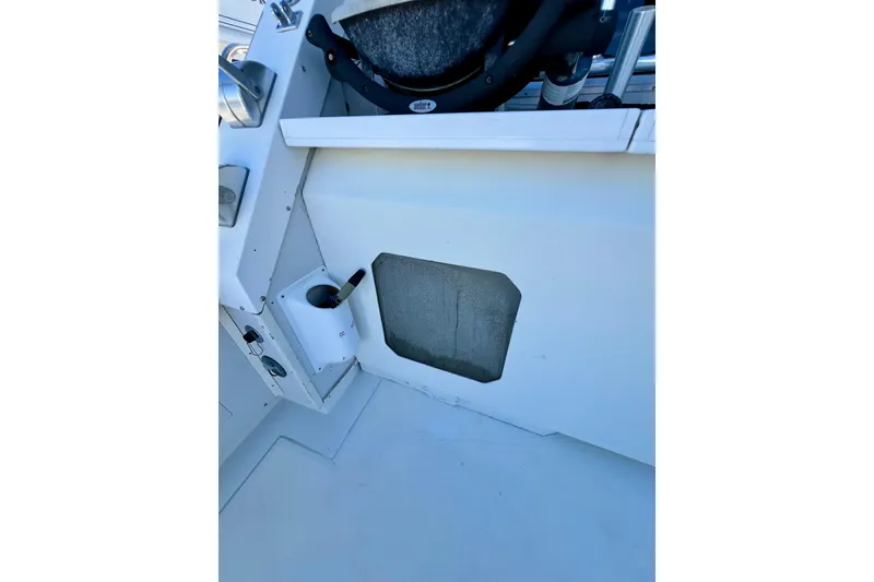 Slide: The Image of Interior view of a 1982 Bertram 46 Convertible boat cockpit area. - 34
