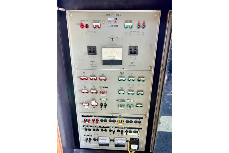 Slide: The Image of Electrical control panel on a 1982 Bertram 46 Convertible yacht. - 58