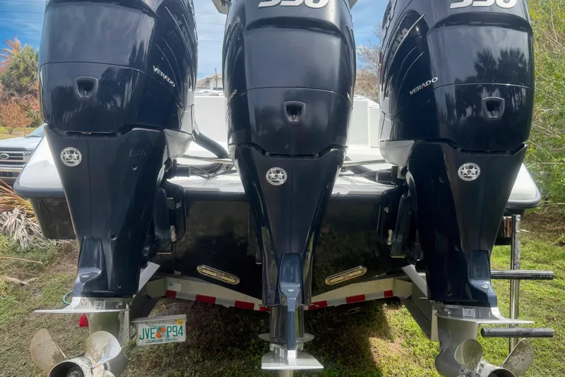 Slide: The Image of Brown quilted seat on 2018 Yellowfin 36 Offshore boat, showcasing luxury and comfort. - 12