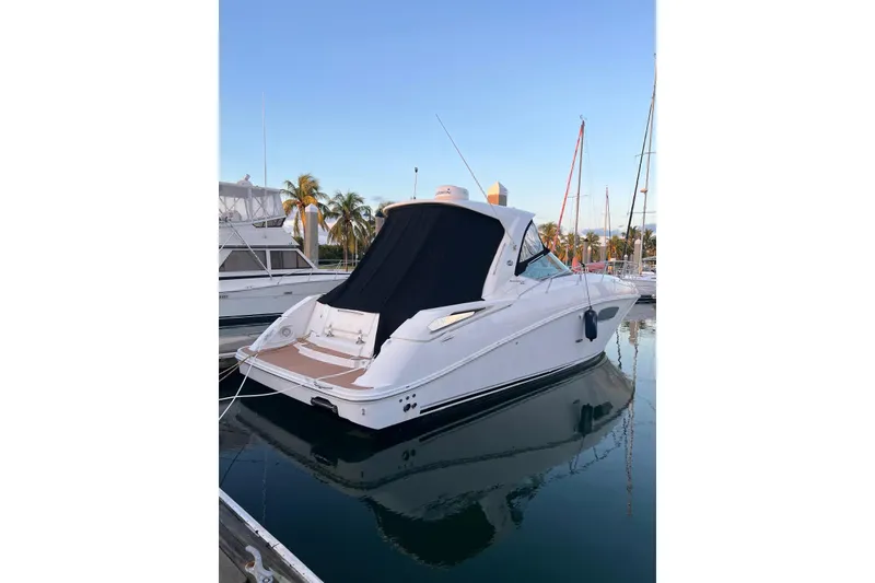 Slide: The Image of 2009 Sea Ray Sundancer 350 yacht docked in marina, rear view. - 29